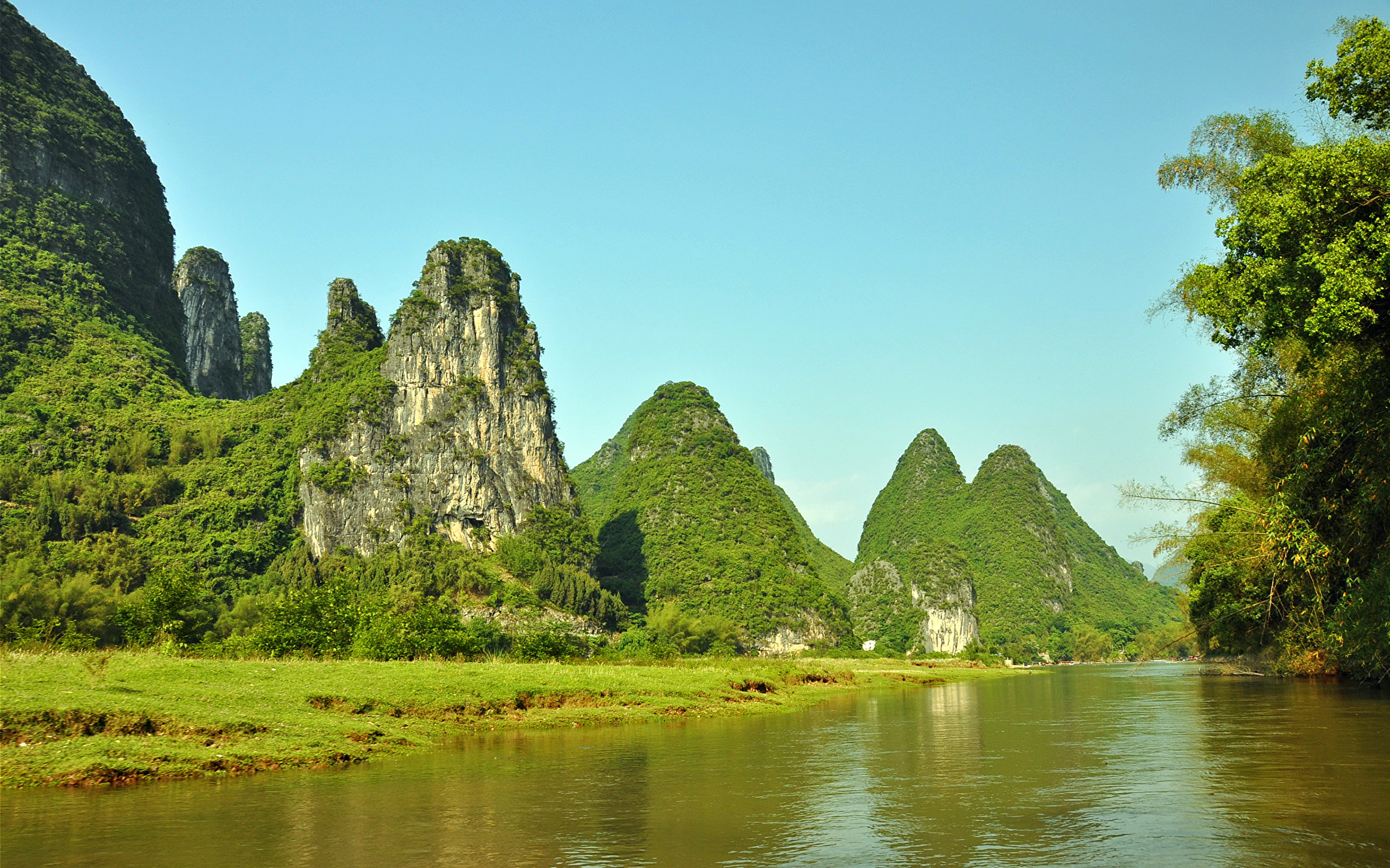 Wallpaper Green and Brown Mountain Beside Body of Water During Daytime ...