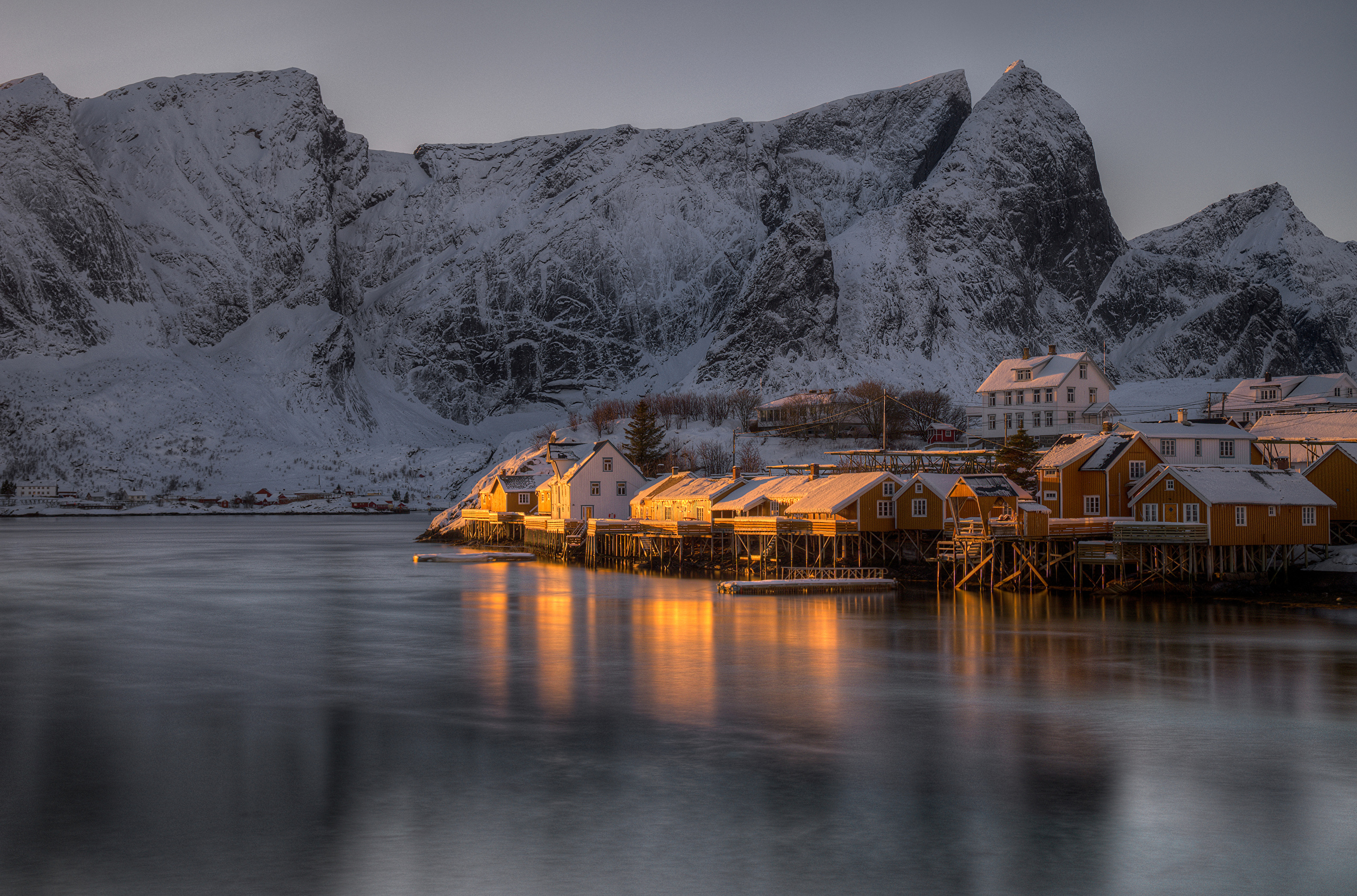 Wallpaper Brown Wooden House on Body of Water Near Gray Mountain During ...