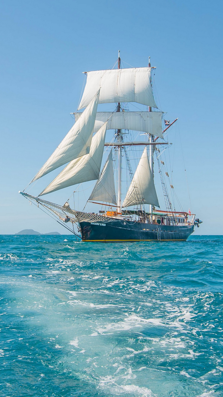 White and Brown Sail Boat on Blue Sea During Daytime. Wallpaper in 750x1334 Resolution
