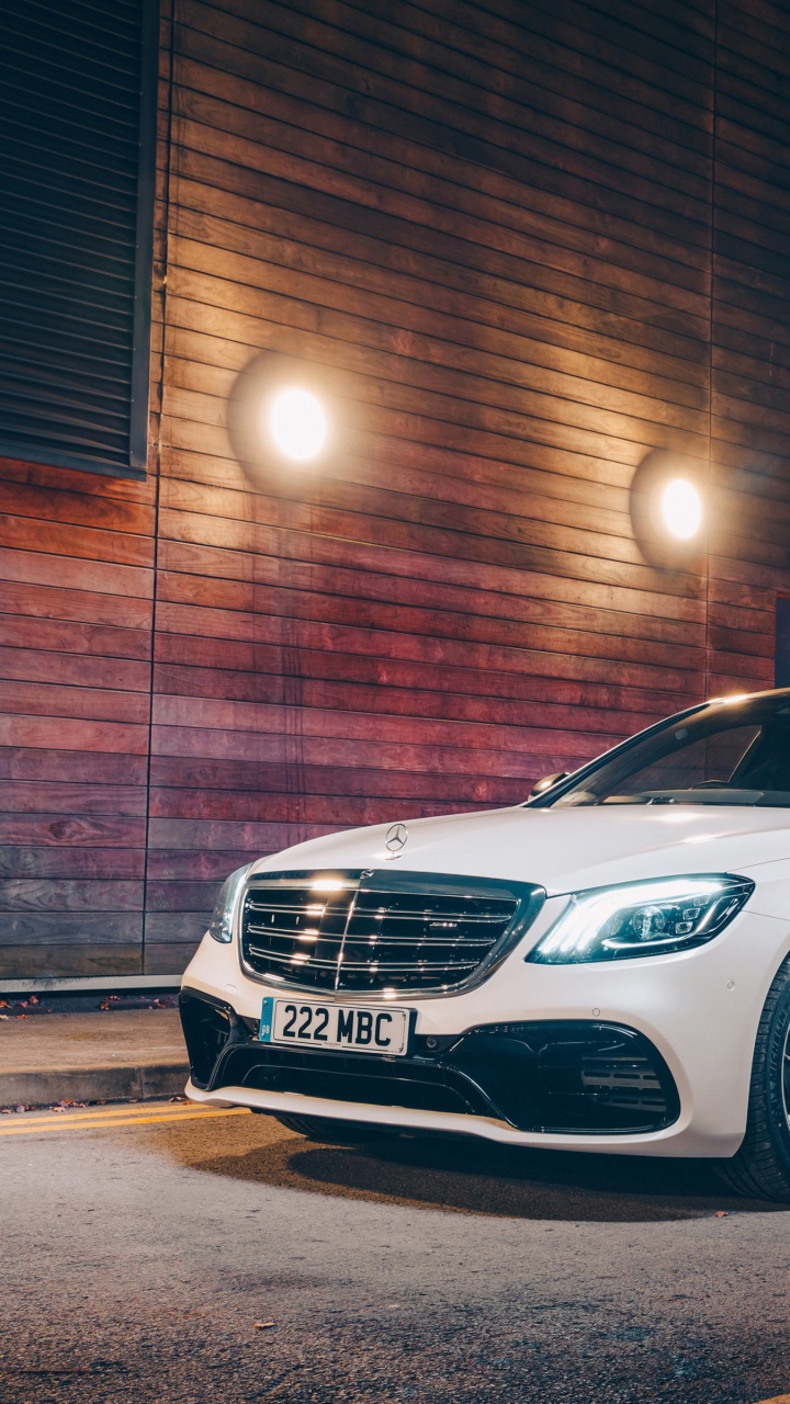 White Mercedes Benz Coupe Parked on Parking Lot During Night Time. Wallpaper in 720x1280 Resolution