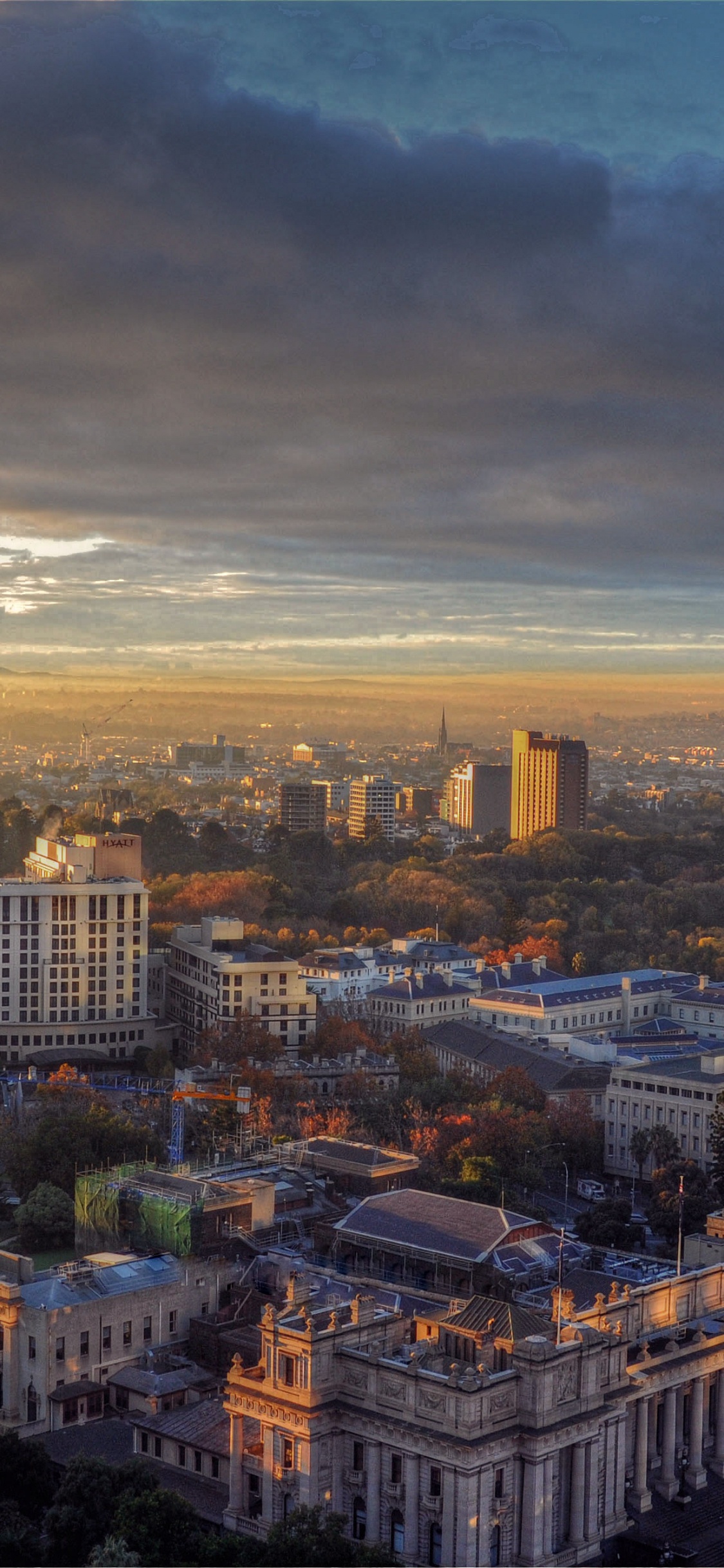Vue Aérienne Des Bâtiments de la Ville Pendant la Journée. Wallpaper in 1125x2436 Resolution