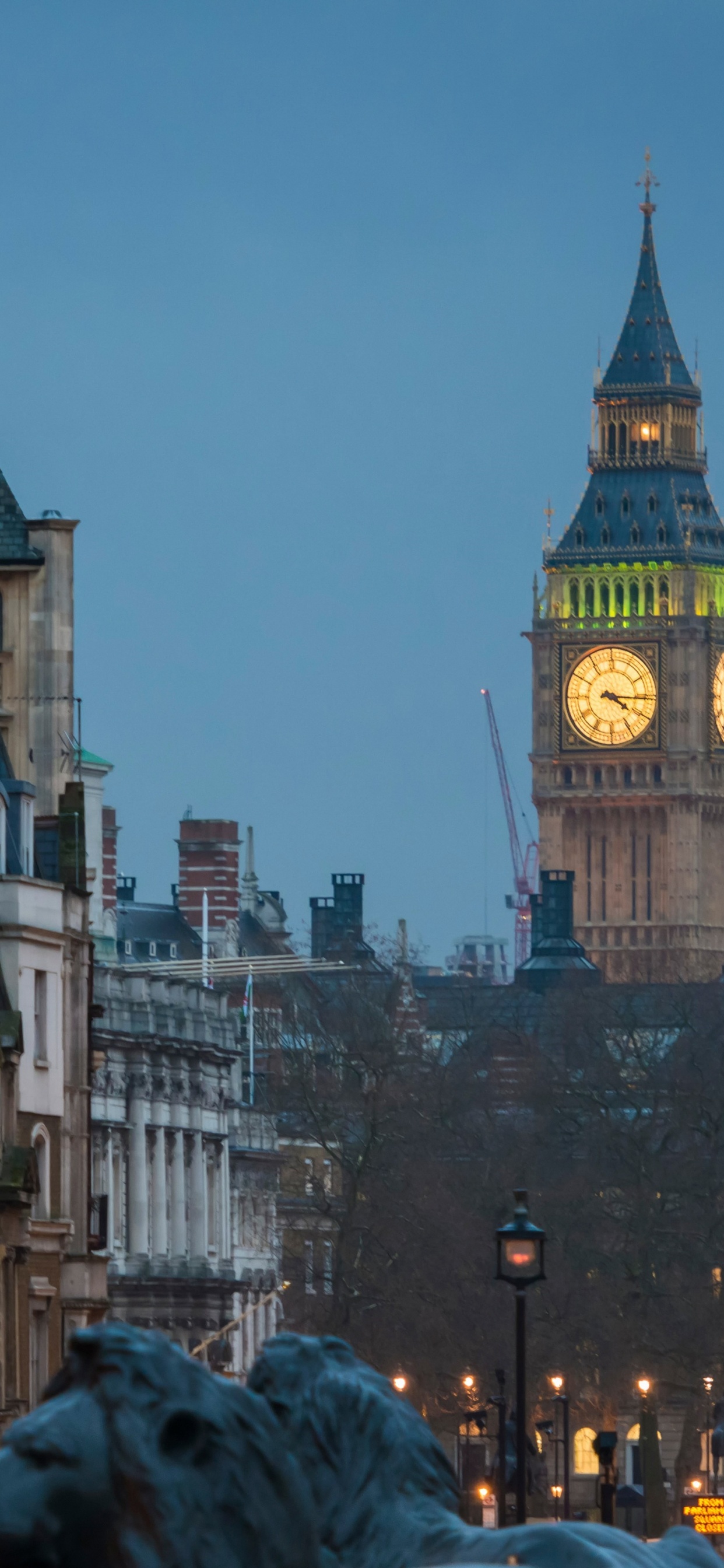 People Walking on Street Near White Concrete Building During Daytime. Wallpaper in 1242x2688 Resolution
