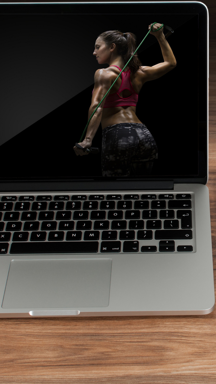 Woman in Black Tank Top and Blue Denim Shorts Sitting Beside Woman in Black Tank Top. Wallpaper in 750x1334 Resolution