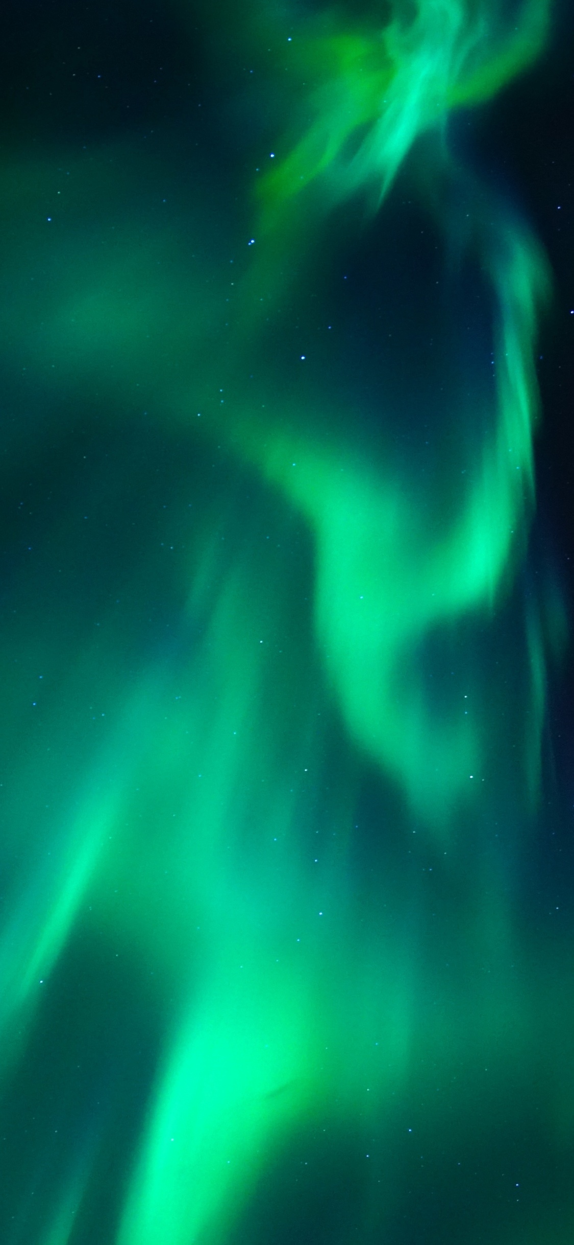 Luz Verde y Azul en Una Habitación Oscura.. Wallpaper in 1125x2436 Resolution