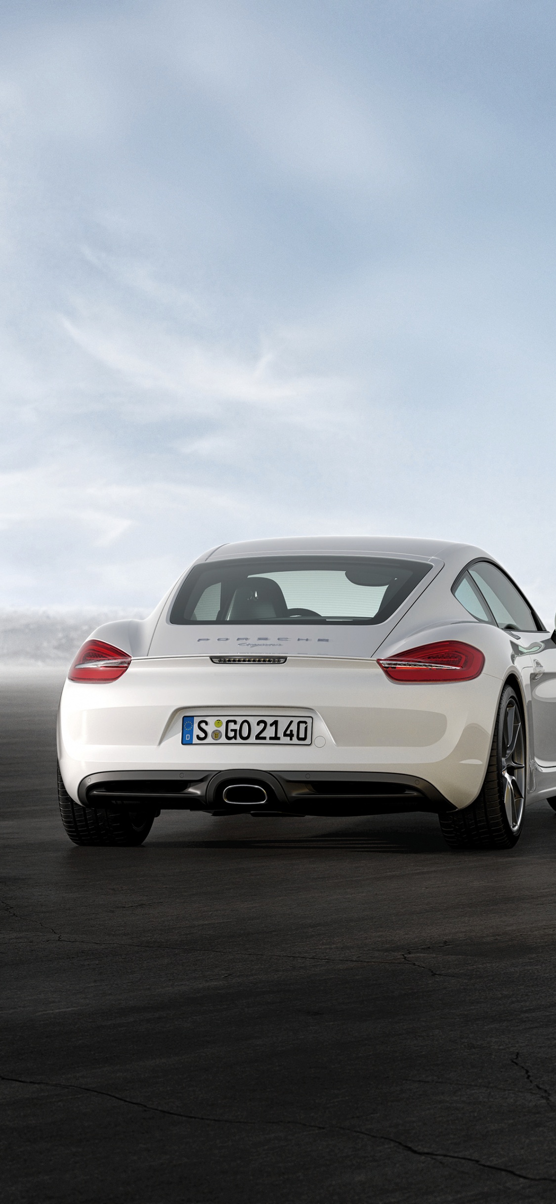 Gelber Porsche 911 Auf Grauem Bürgersteig. Wallpaper in 1125x2436 Resolution