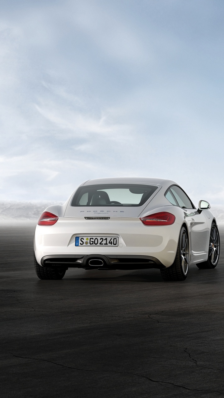 Gelber Porsche 911 Auf Grauem Bürgersteig. Wallpaper in 720x1280 Resolution