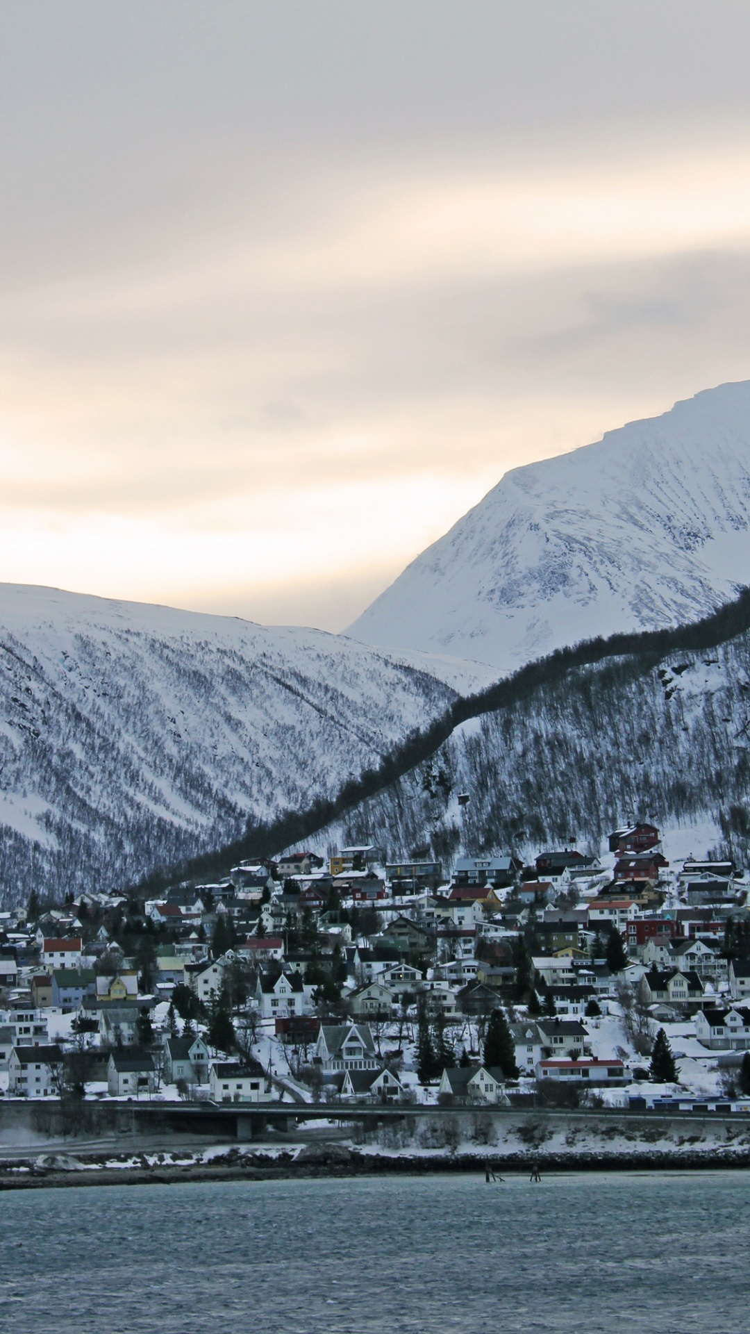 White and Brown Houses Near Mountain Under White Sky During Daytime. Wallpaper in 1080x1920 Resolution