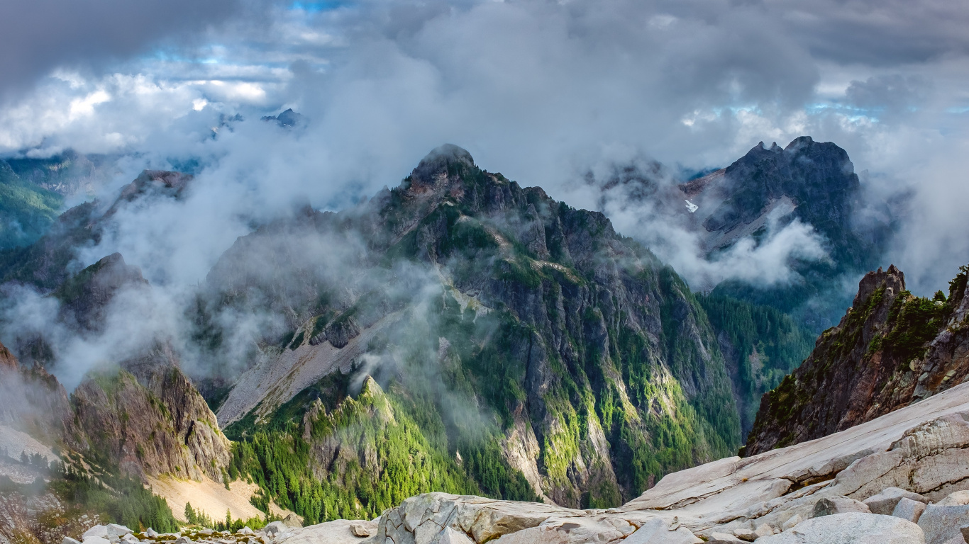 Green and Brown Mountain Under White Clouds During Daytime. Wallpaper in 1366x768 Resolution