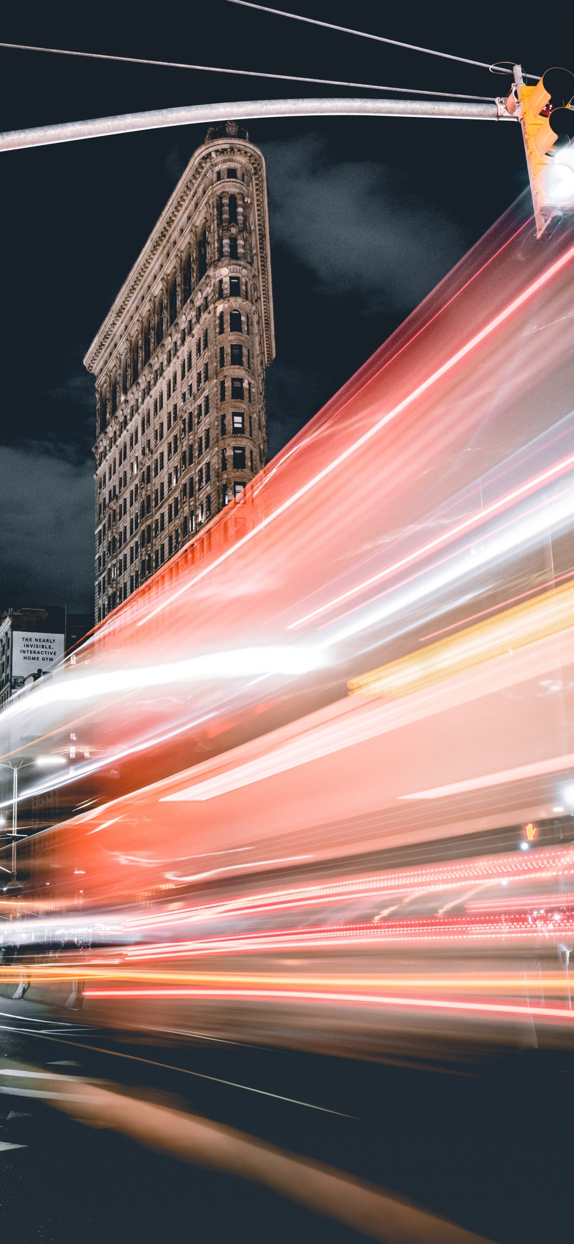 Time Lapse Photography of Cars on Road During Night Time. Wallpaper in 1125x2436 Resolution