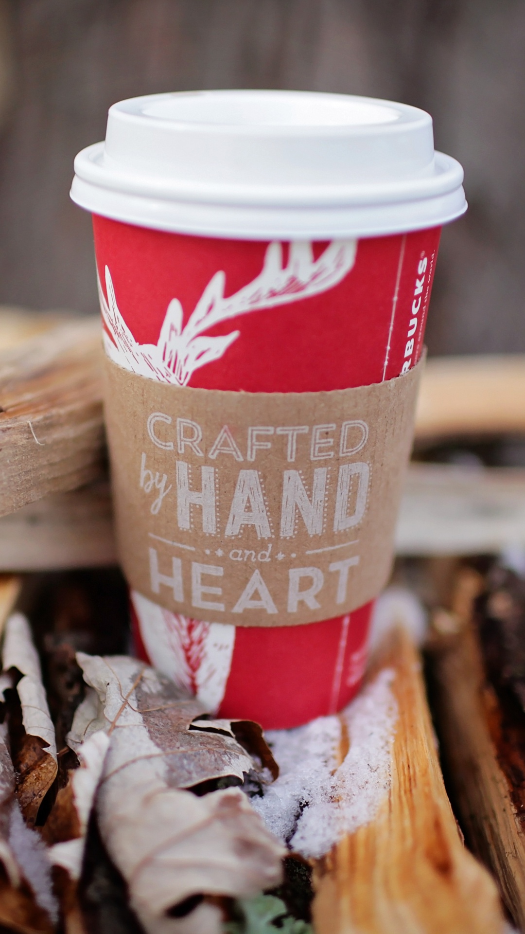 Red and White Disposable Cup on Brown Wooden Table. Wallpaper in 1080x1920 Resolution