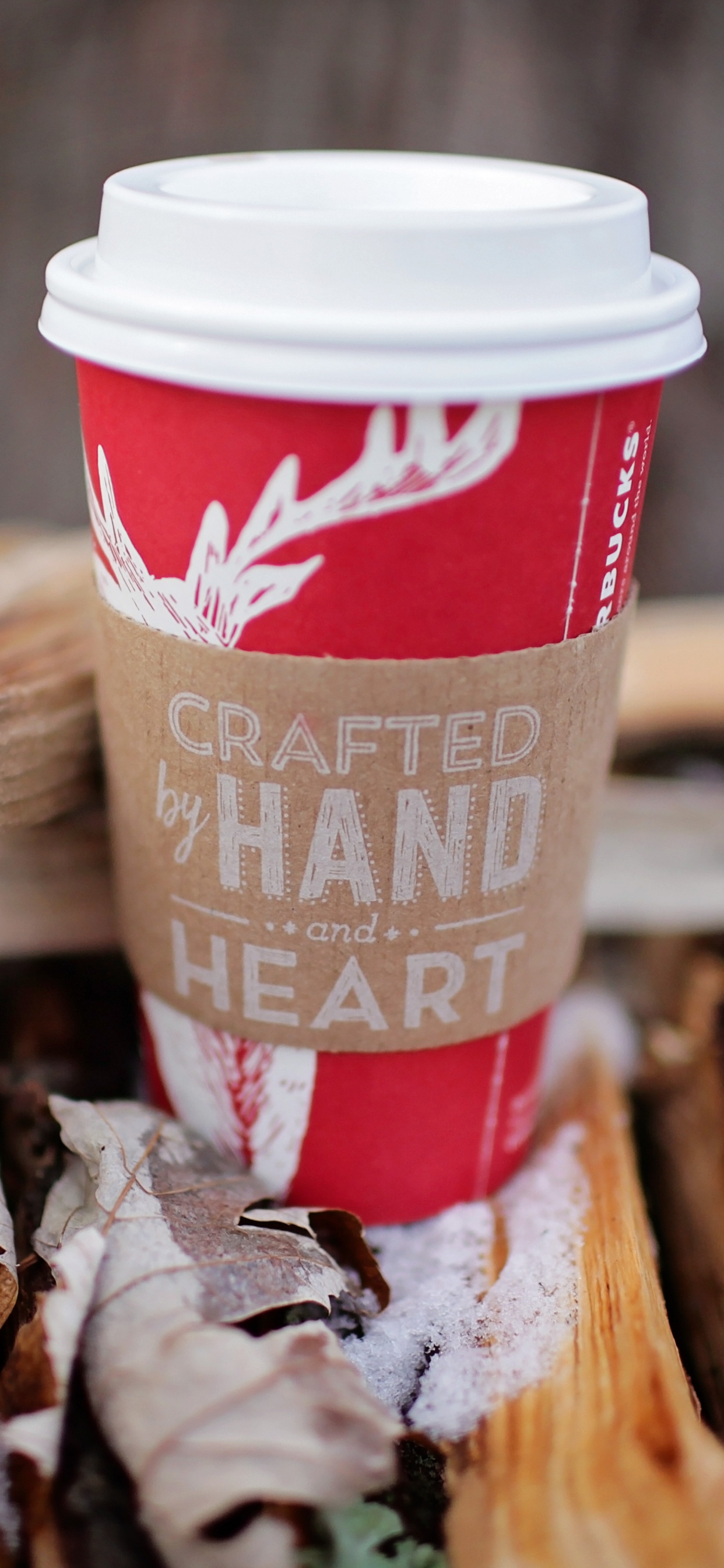 Red and White Disposable Cup on Brown Wooden Table. Wallpaper in 1242x2688 Resolution