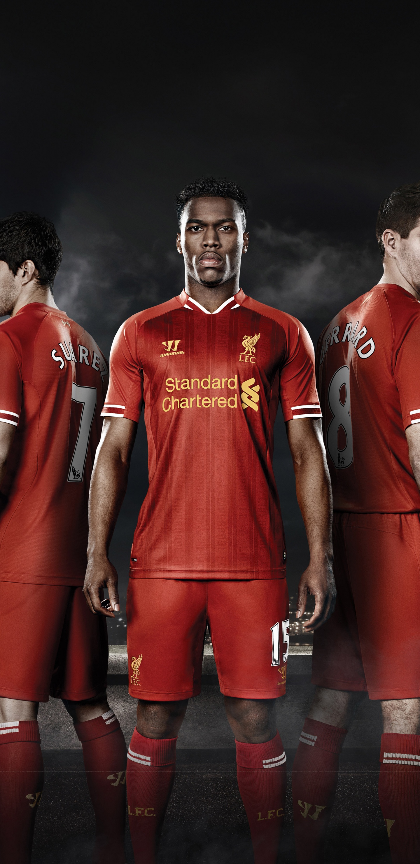 2 Men in Red Shirts Standing on Gray Concrete Bridge During Nighttime. Wallpaper in 1440x2960 Resolution