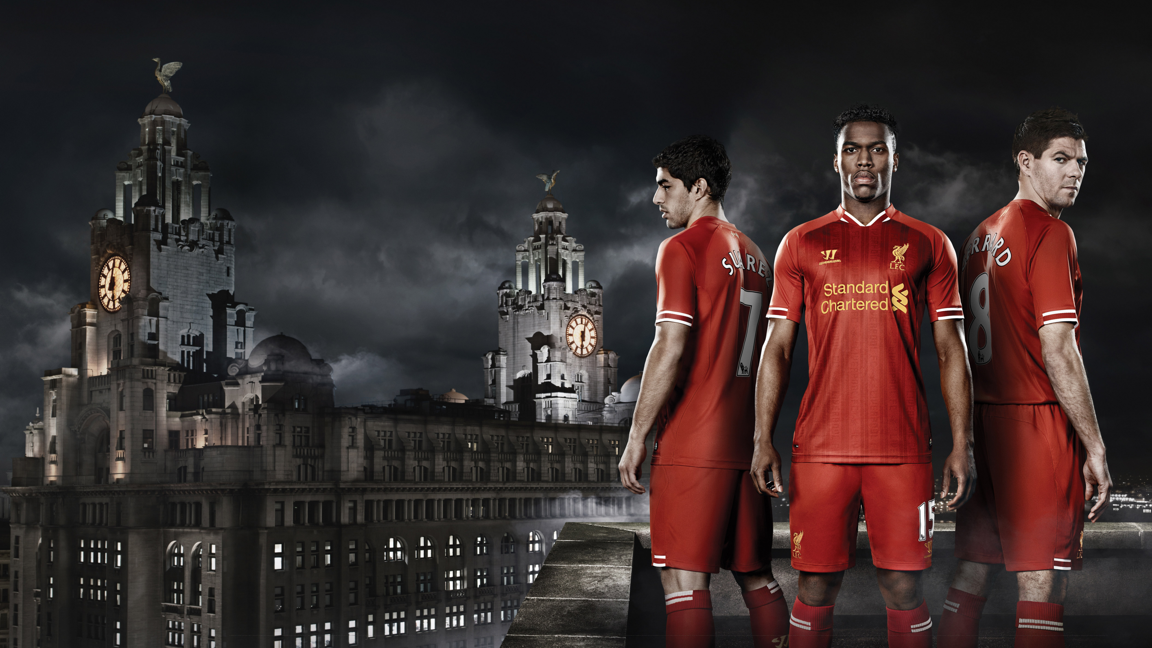 2 Men in Red Shirts Standing on Gray Concrete Bridge During Nighttime. Wallpaper in 3840x2160 Resolution