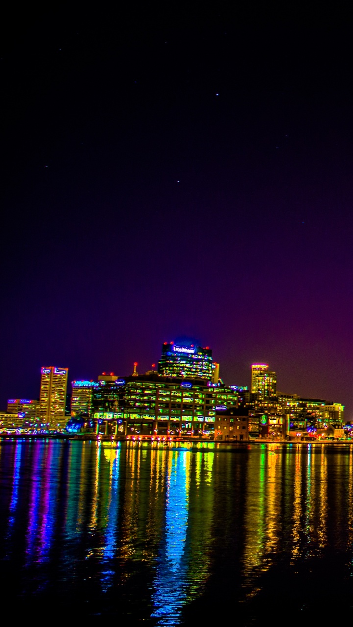 City Skyline During Night Time. Wallpaper in 720x1280 Resolution