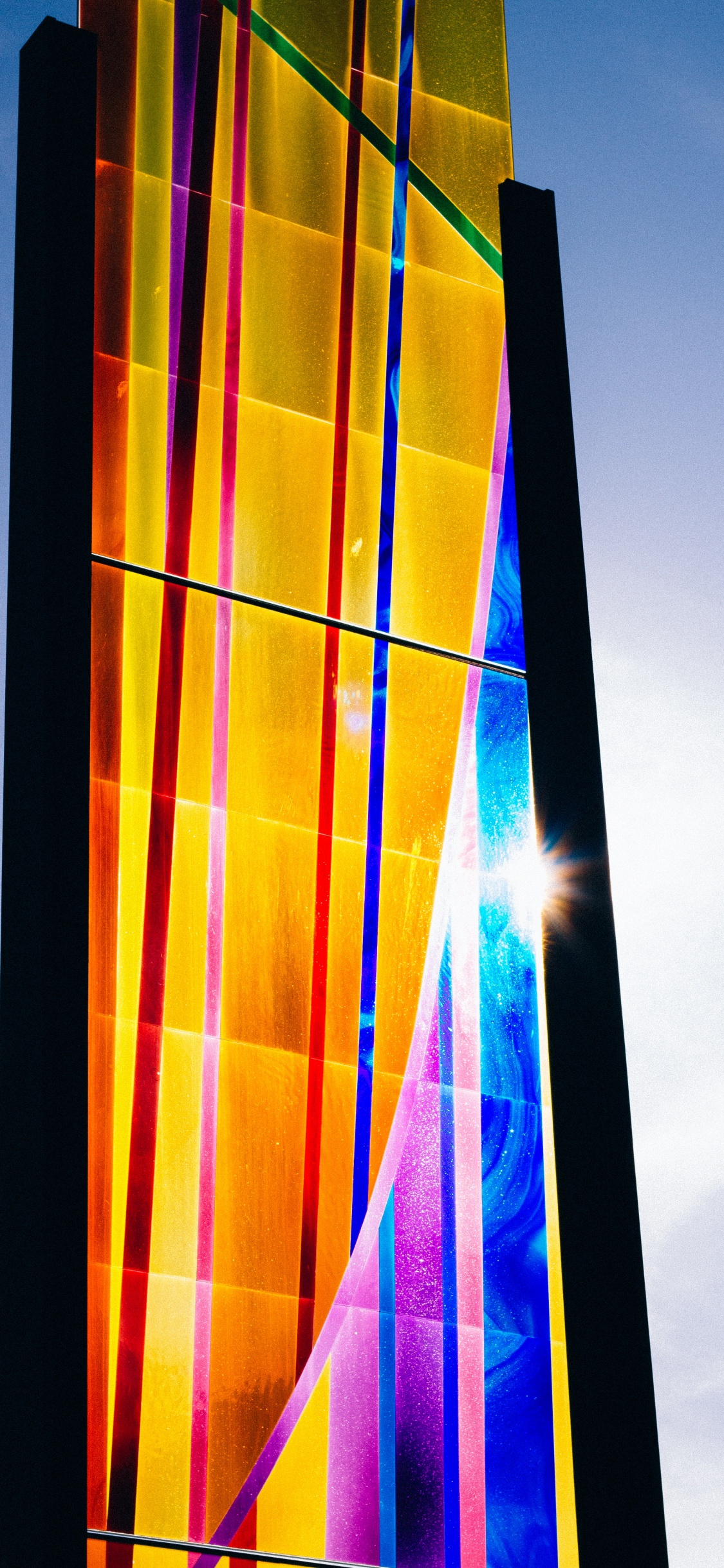 Verre Bleu Rouge et Jaune. Wallpaper in 1125x2436 Resolution