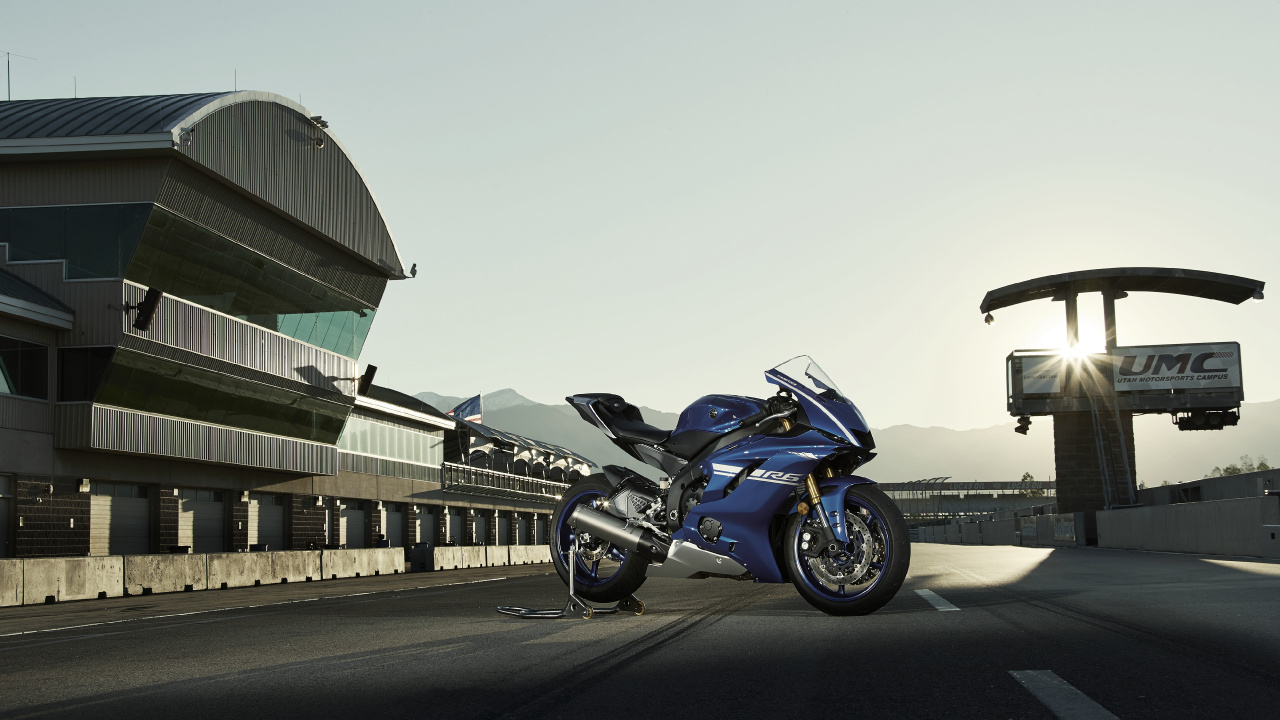 Blue and Black Sports Bike Parked on Gray Concrete Road During Daytime. Wallpaper in 1280x720 Resolution