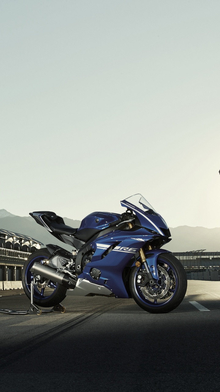 Blue and Black Sports Bike Parked on Gray Concrete Road During Daytime. Wallpaper in 720x1280 Resolution