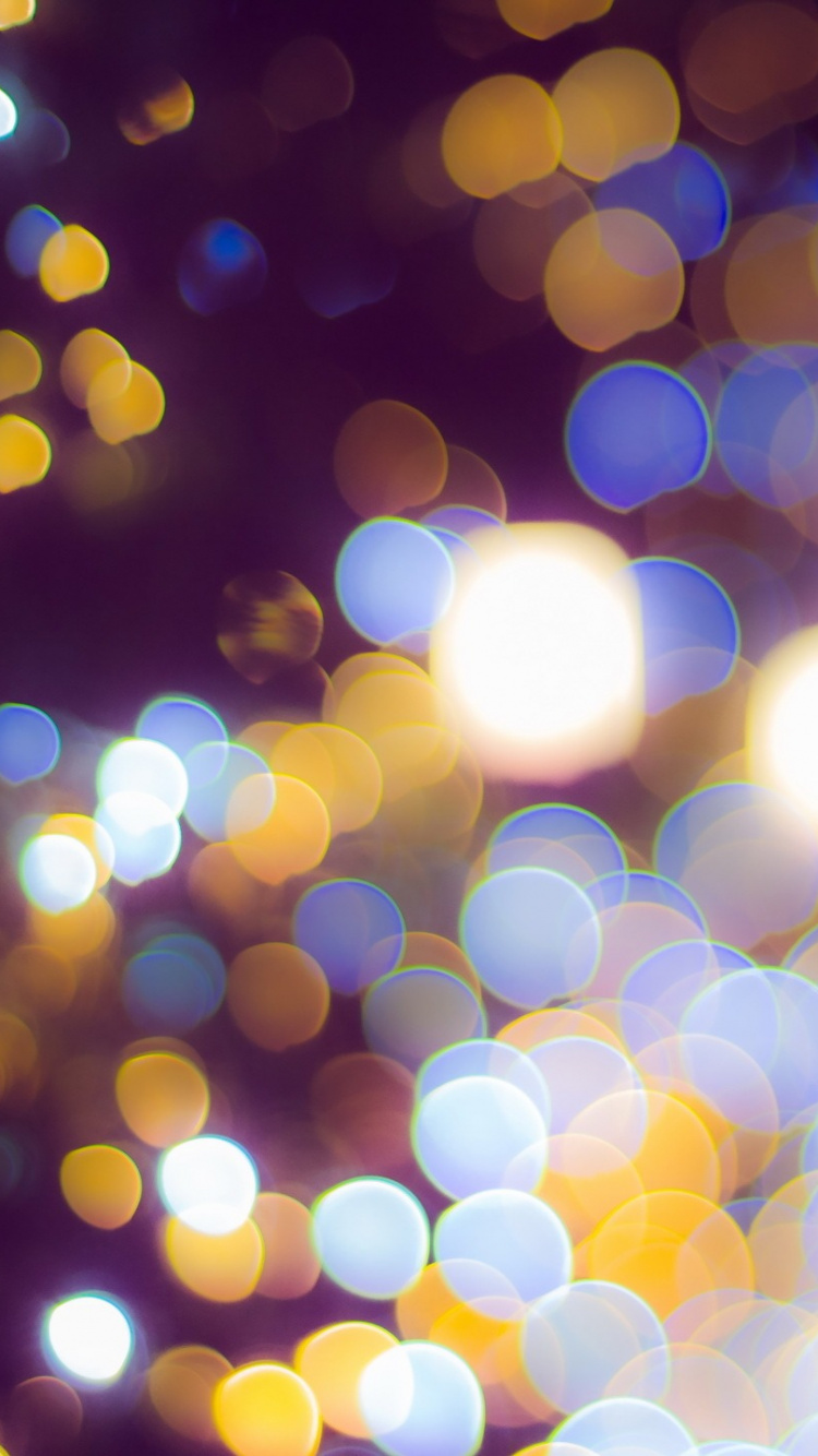 Yellow and White Bokeh Lights. Wallpaper in 750x1334 Resolution