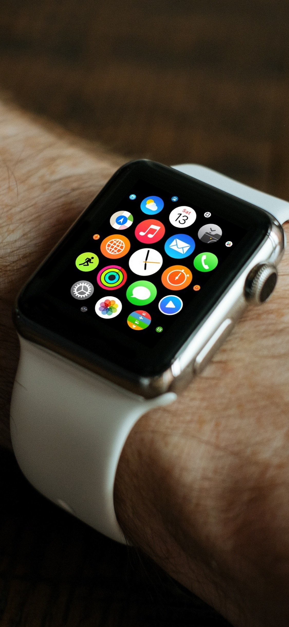 Silver Aluminum Case Apple Watch With White Sport Band. Wallpaper in 1125x2436 Resolution