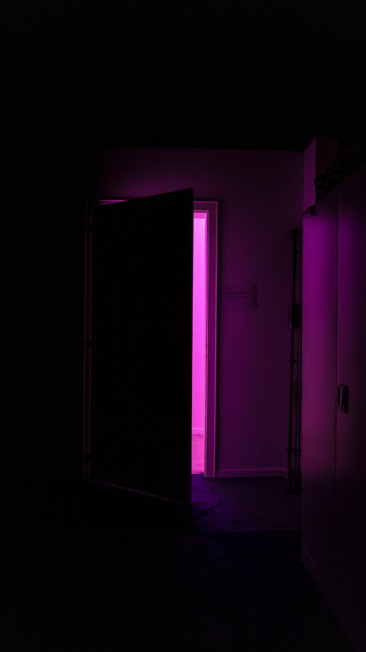 White Wooden Door Near Purple Wall. Wallpaper in 720x1280 Resolution