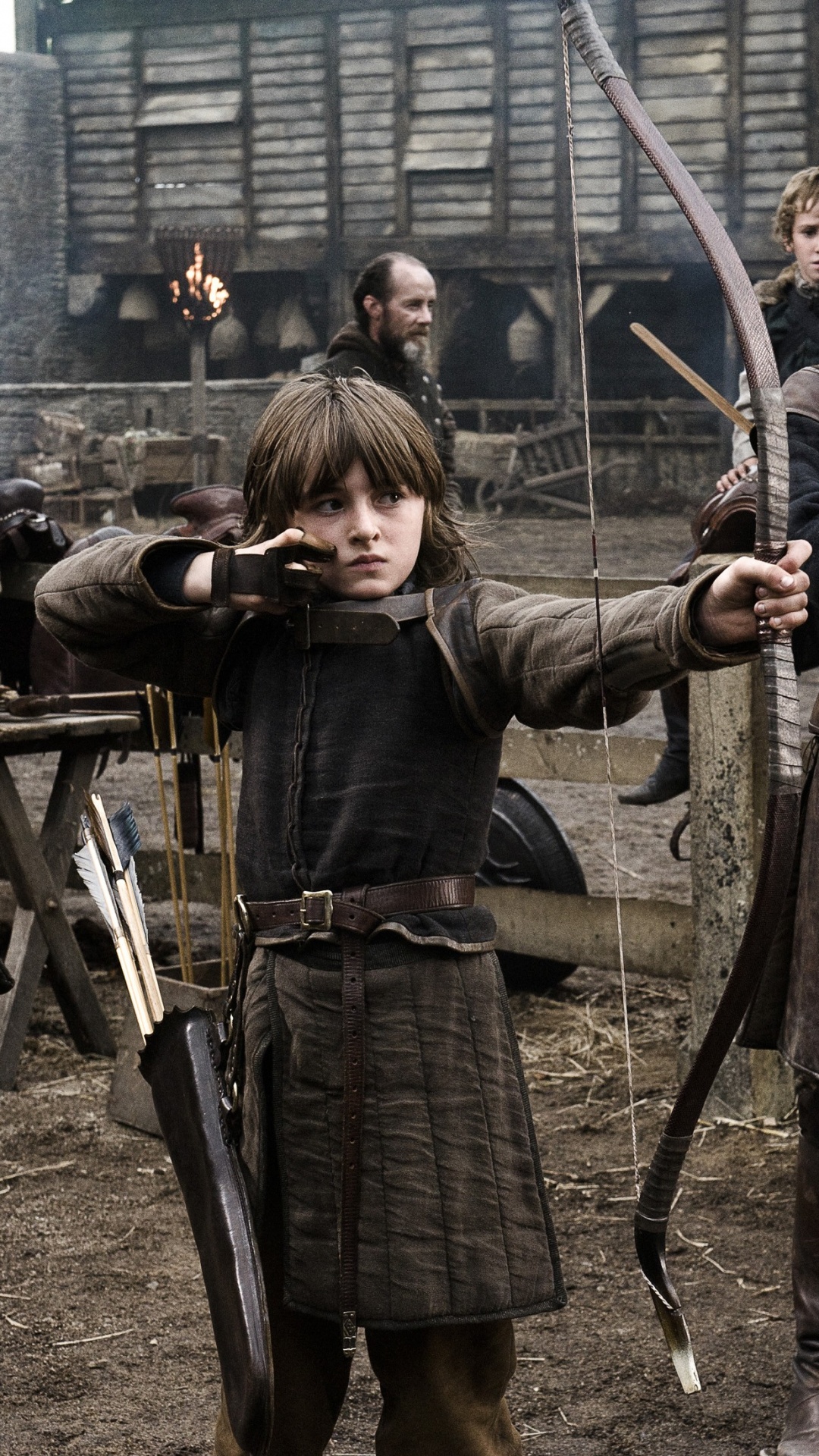 Man in Black Long Sleeve Shirt Holding Bow and Arrow. Wallpaper in 1080x1920 Resolution