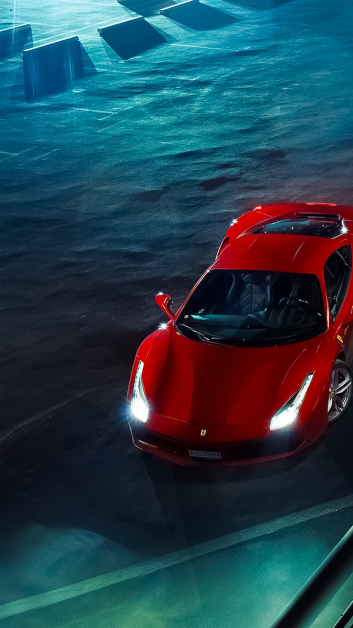 Red Ferrari Sports Car on Bridge. Wallpaper in 720x1280 Resolution