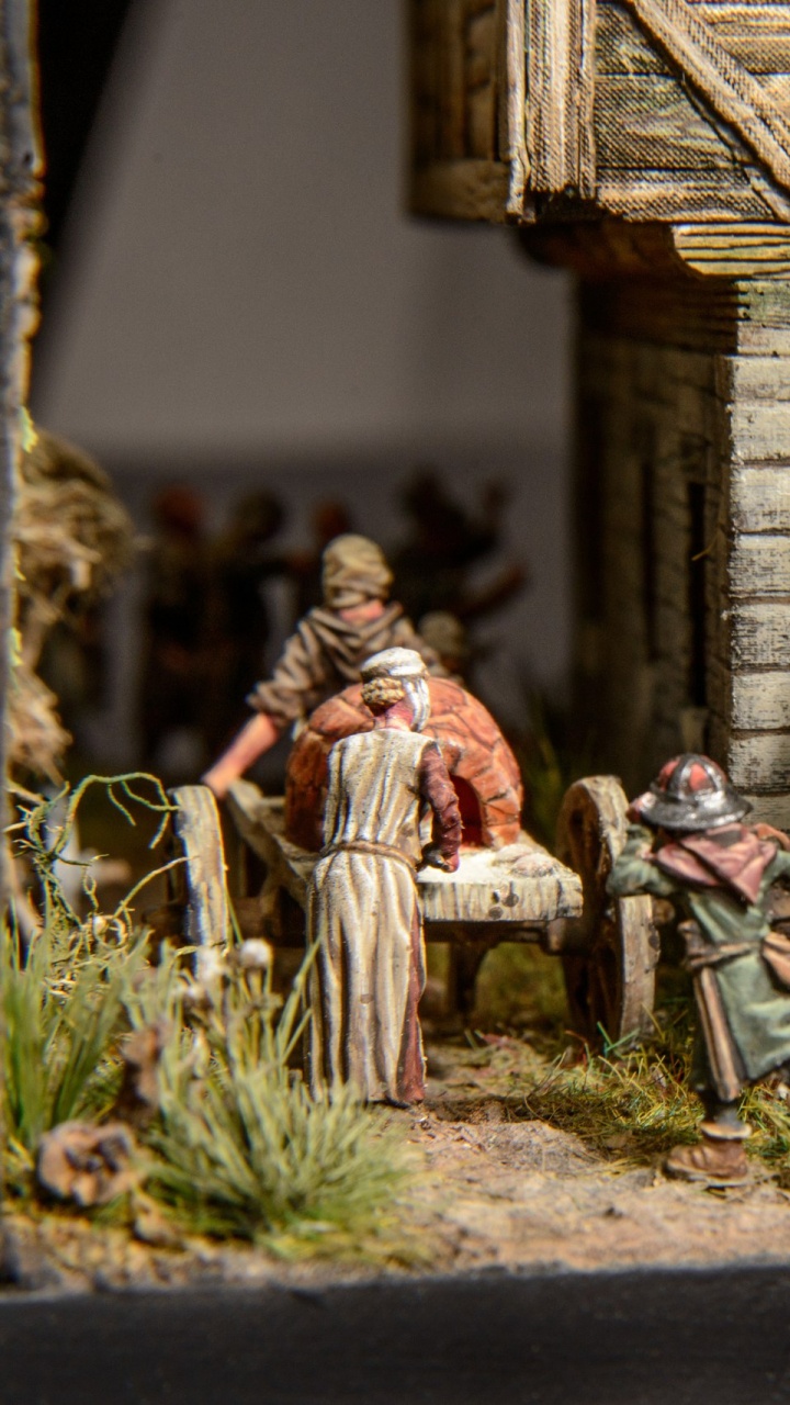 Enfants Assis Sur un Banc en Bois Devant Une Maison en Bois Pendant la Journée. Wallpaper in 720x1280 Resolution