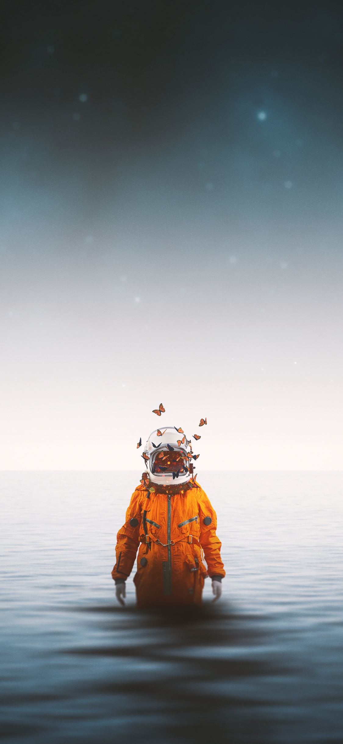 Person in Orangefarbener Jacke, Die Unter Sternennacht Auf Wasser Steht. Wallpaper in 1125x2436 Resolution