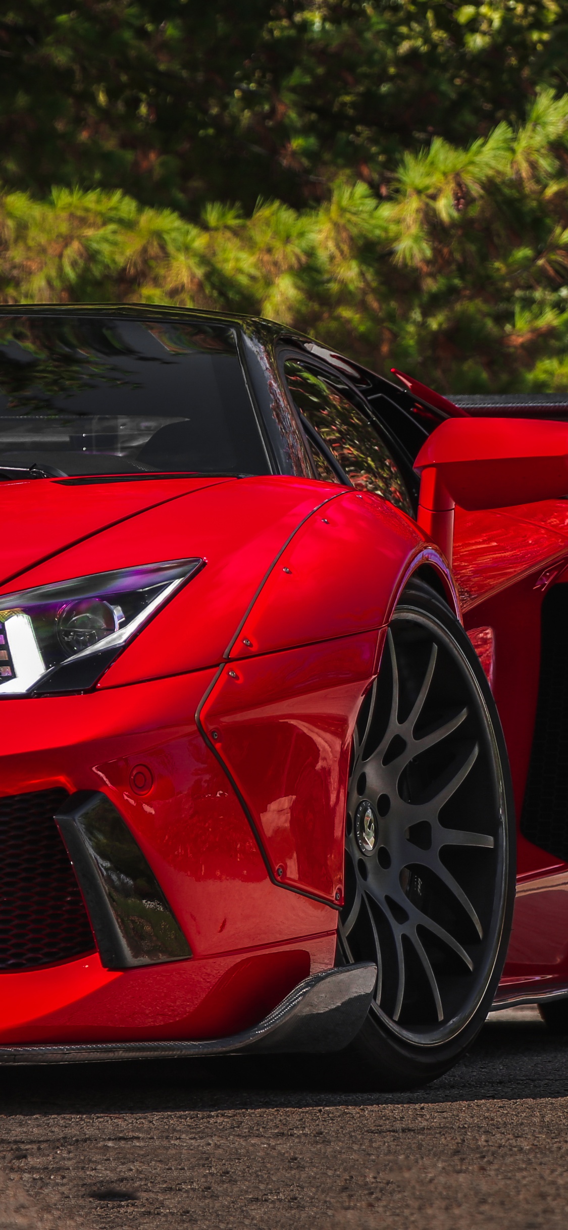 Roter Ferrari 458 Italia Tagsüber Unterwegs. Wallpaper in 1125x2436 Resolution