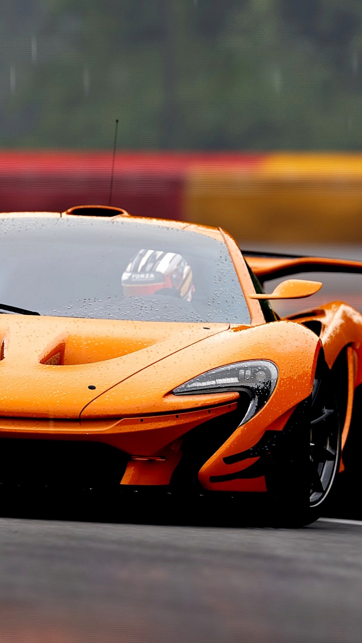 Orangefarbener Lamborghini Aventador Tagsüber Unterwegs. Wallpaper in 720x1280 Resolution