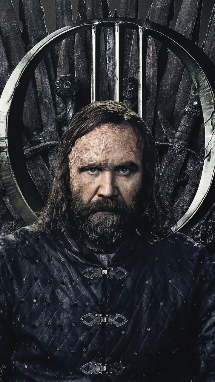 Man in Black Jacket Sitting on Black Metal Chair. Wallpaper in 720x1280 Resolution