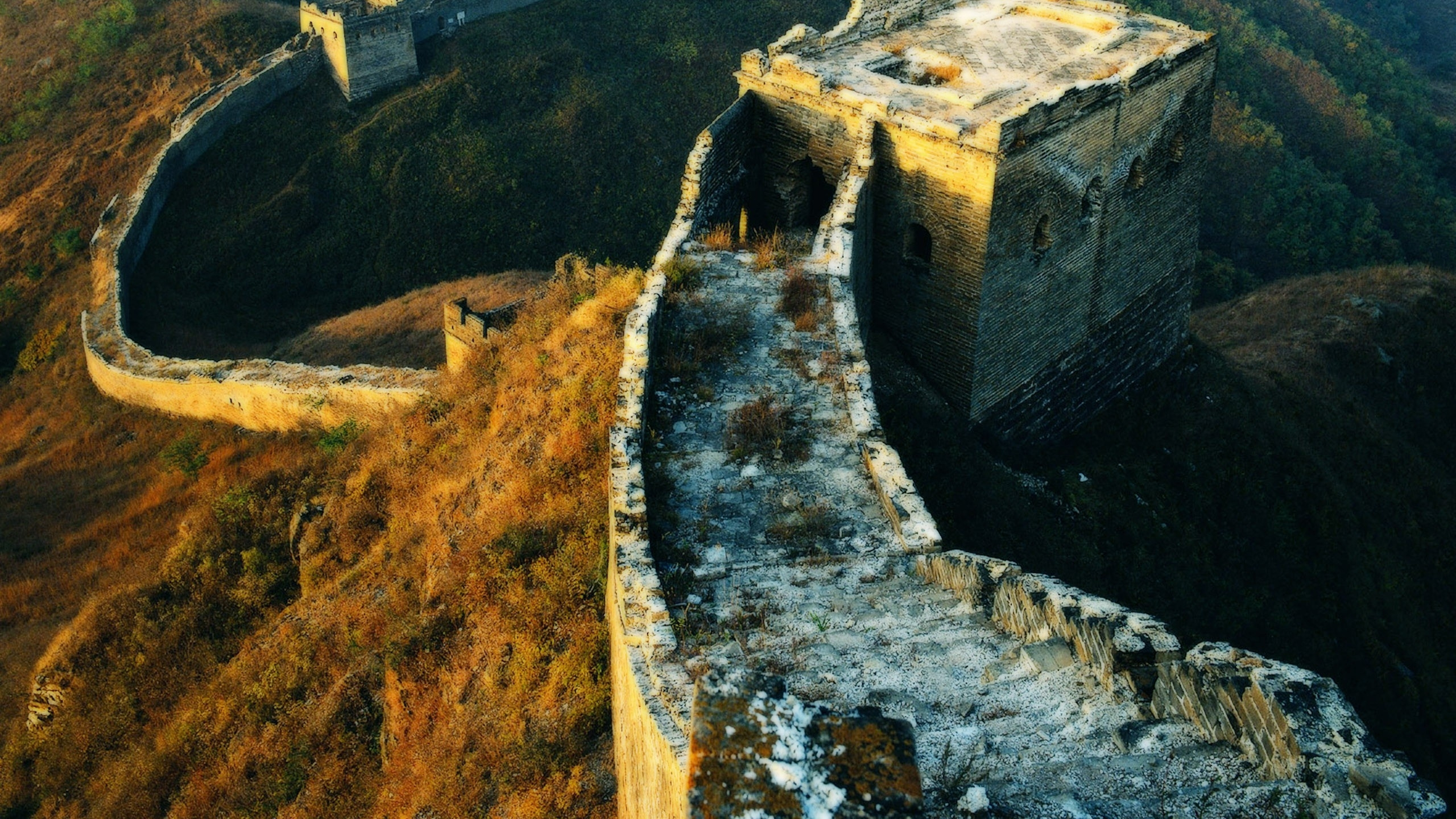 Aerial View of Brown Concrete Building on Top of Mountain During Daytime. Wallpaper in 2560x1440 Resolution