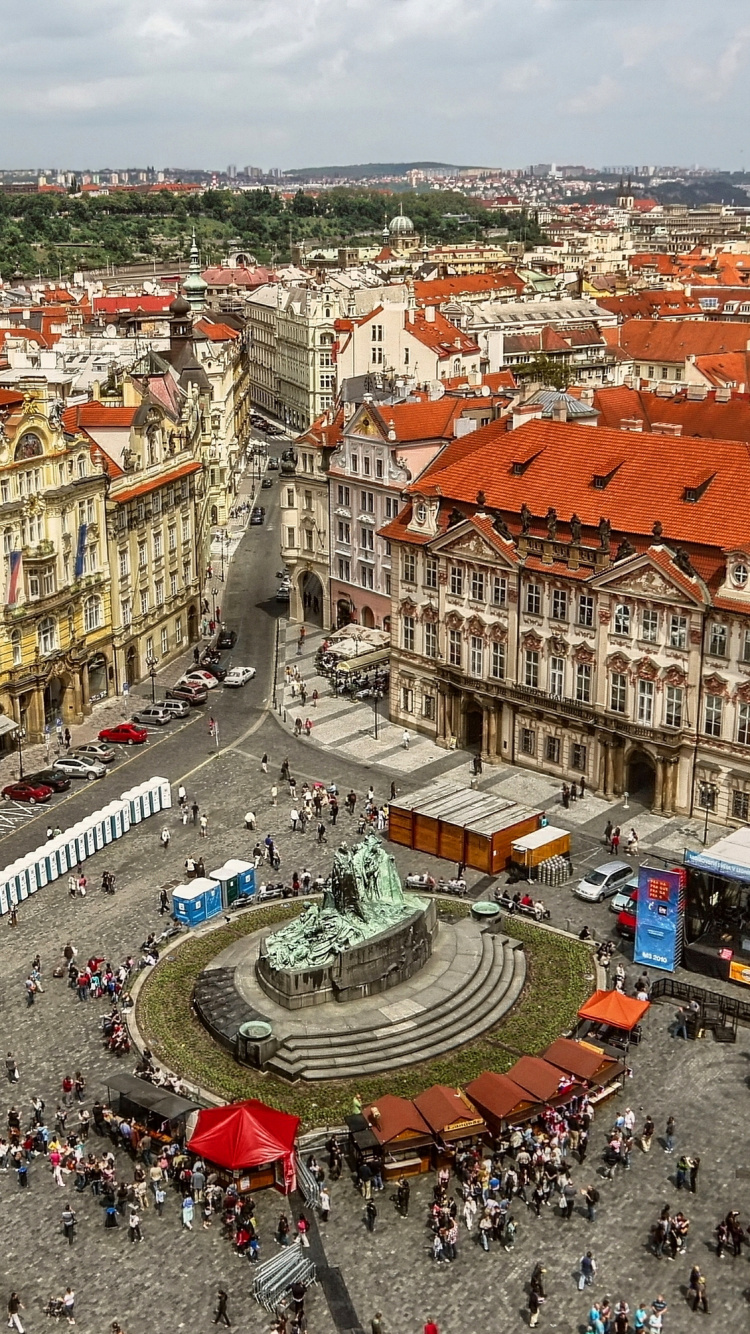People Walking on Street Near Buildings During Daytime. Wallpaper in 750x1334 Resolution