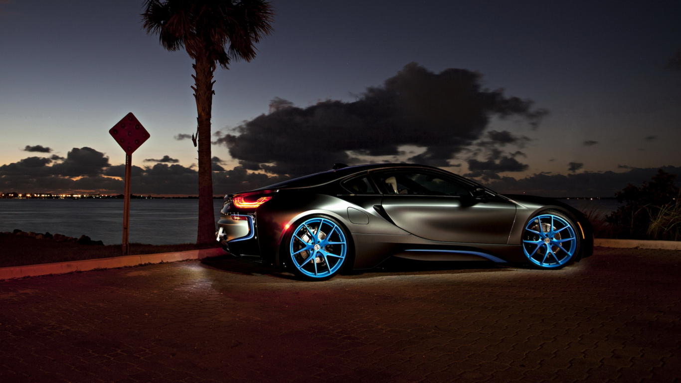 Black Coupe Parked on Dock During Night Time. Wallpaper in 1366x768 Resolution