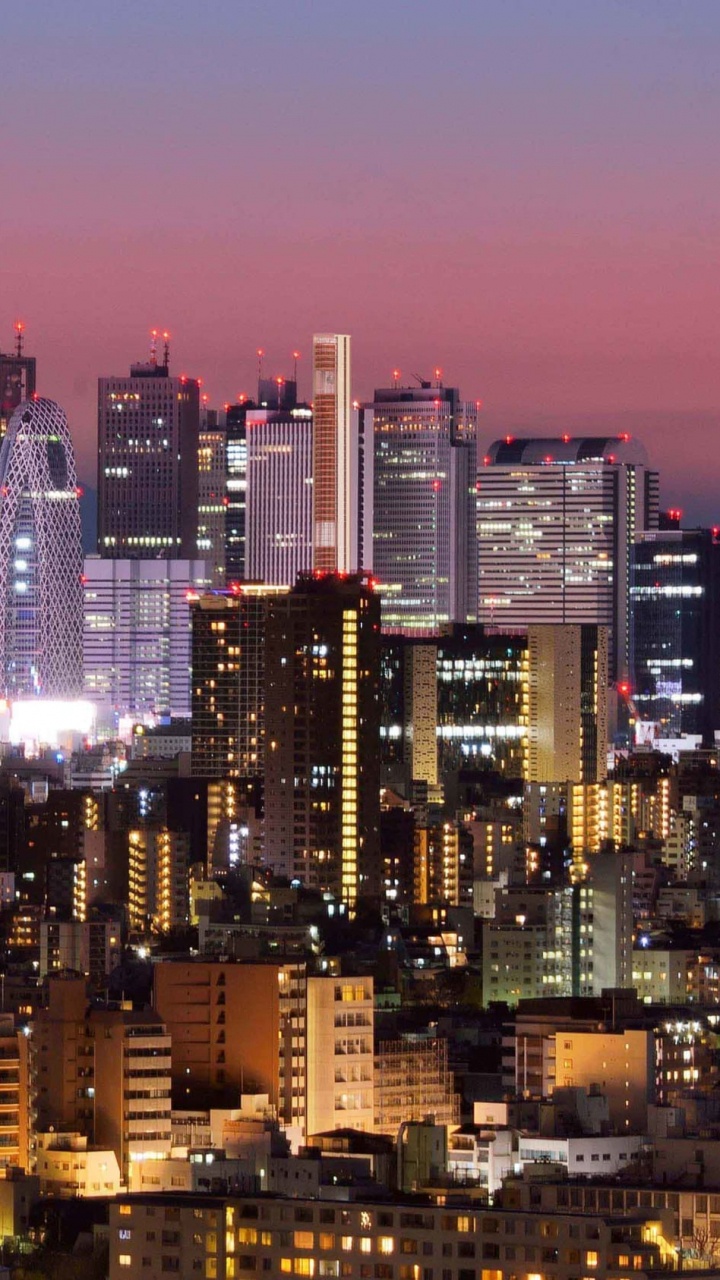 City Skyline During Night Time. Wallpaper in 720x1280 Resolution