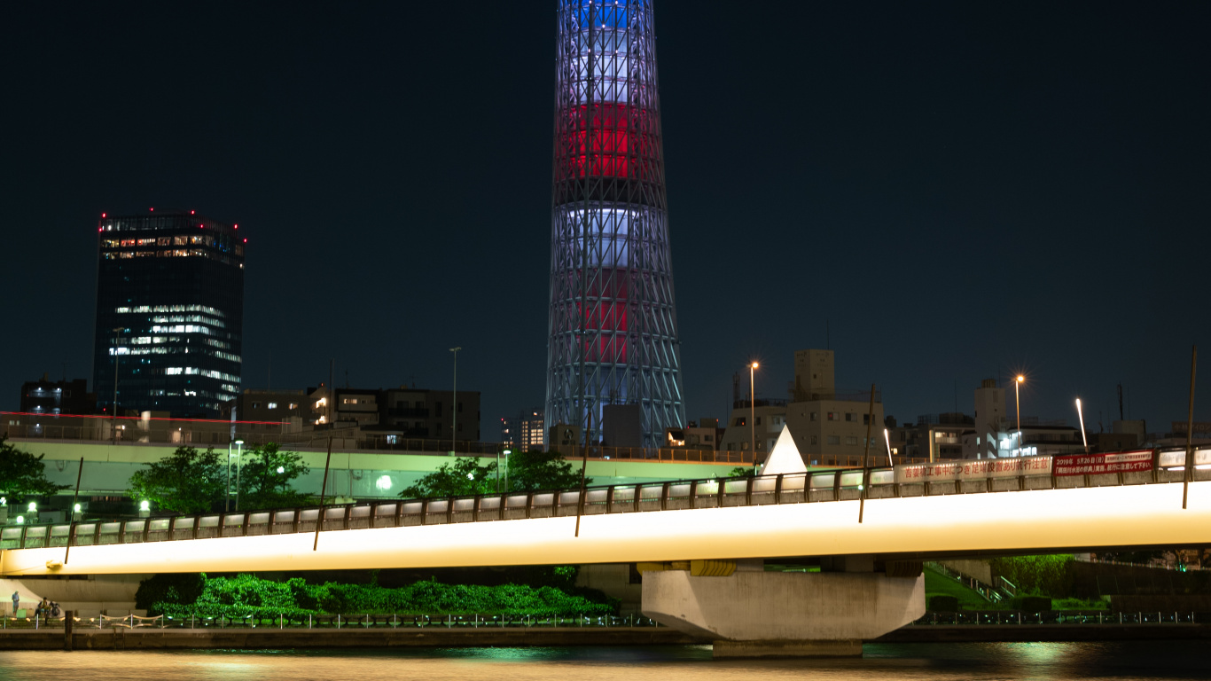 Lighted Tower During Night Time. Wallpaper in 1366x768 Resolution
