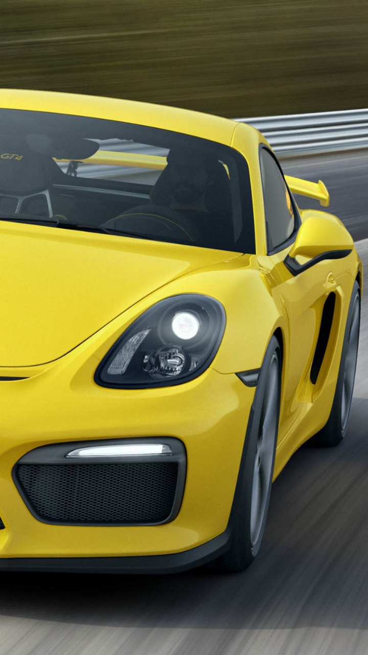 Gelber Porsche 911 Unterwegs. Wallpaper in 720x1280 Resolution