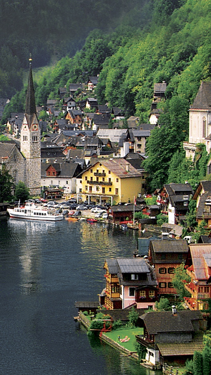 Houses Near Body of Water During Daytime. Wallpaper in 720x1280 Resolution