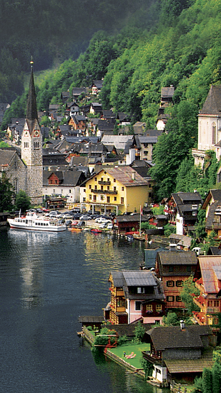 Houses Near Body of Water During Daytime. Wallpaper in 750x1334 Resolution