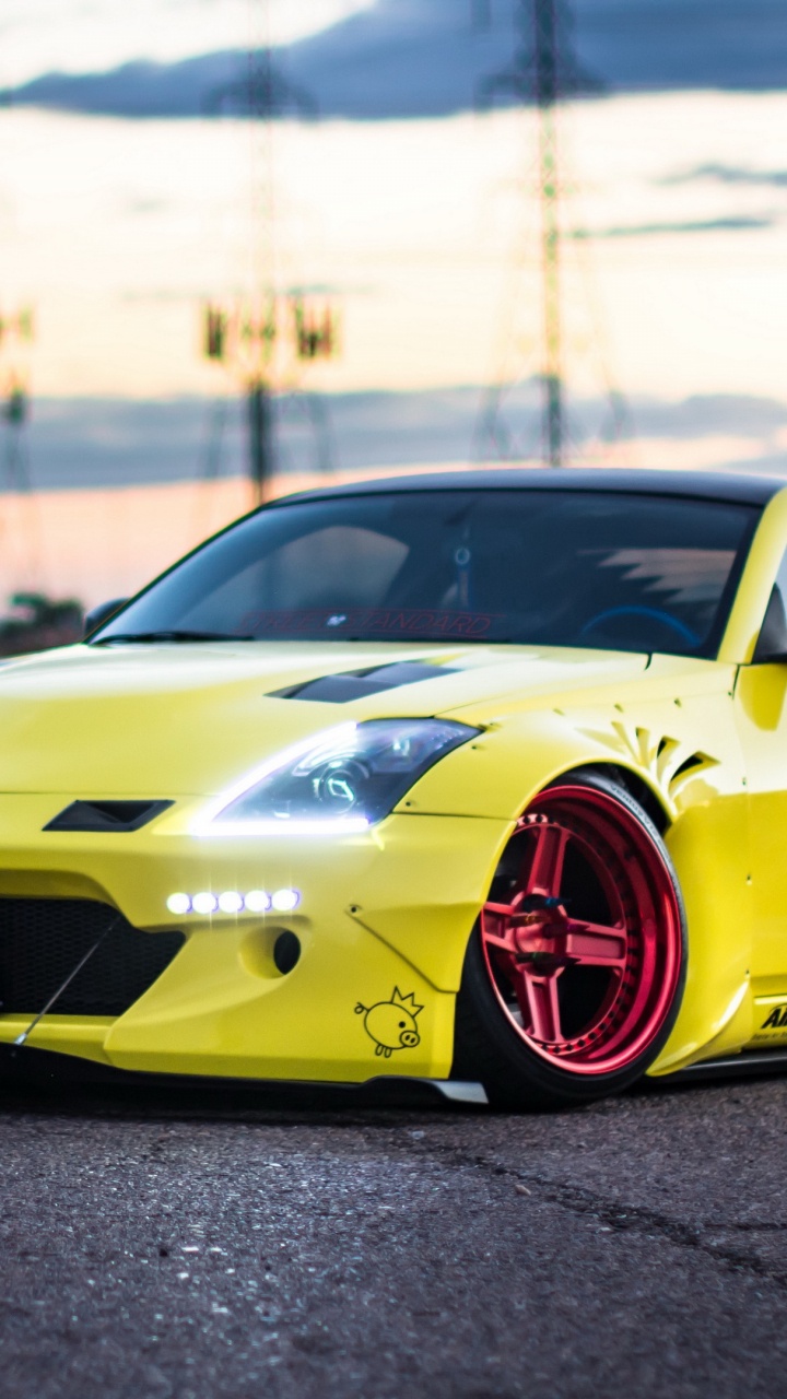 Yellow Lamborghini Aventador on Road During Daytime. Wallpaper in 720x1280 Resolution