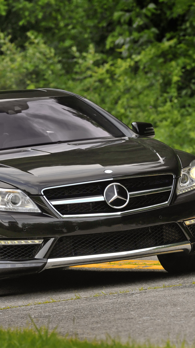 Black Mercedes Benz Coupe on Road During Daytime. Wallpaper in 750x1334 Resolution