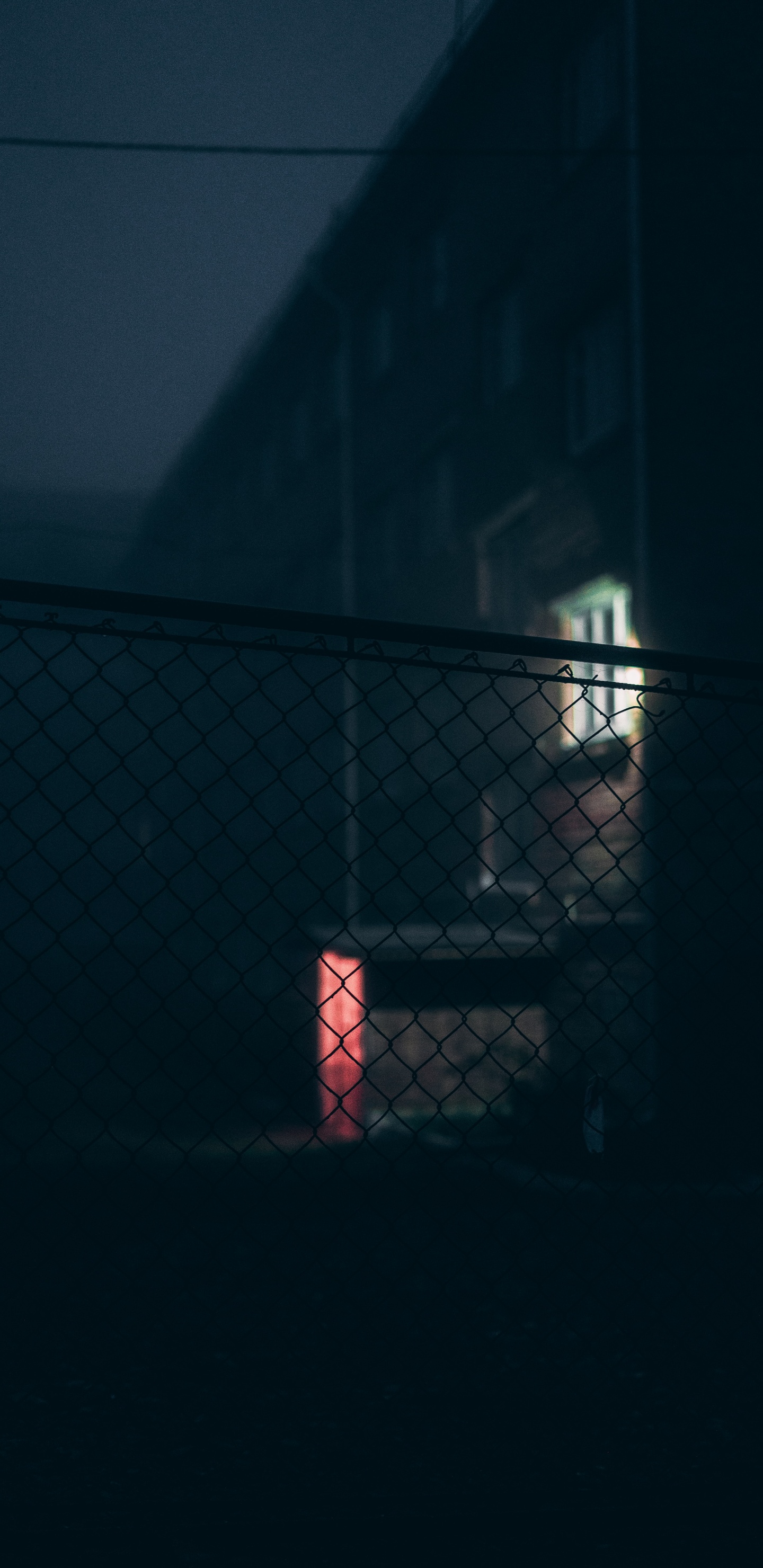 Black Metal Fence Near White Wall. Wallpaper in 1440x2960 Resolution