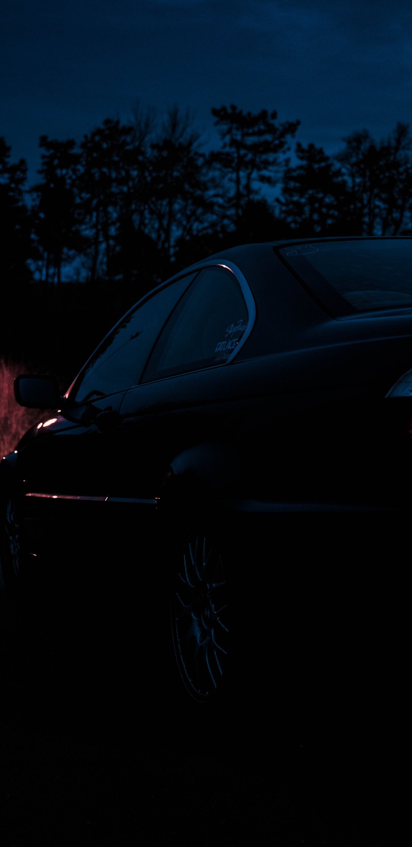 Black Car on Road During Night Time. Wallpaper in 1440x2960 Resolution