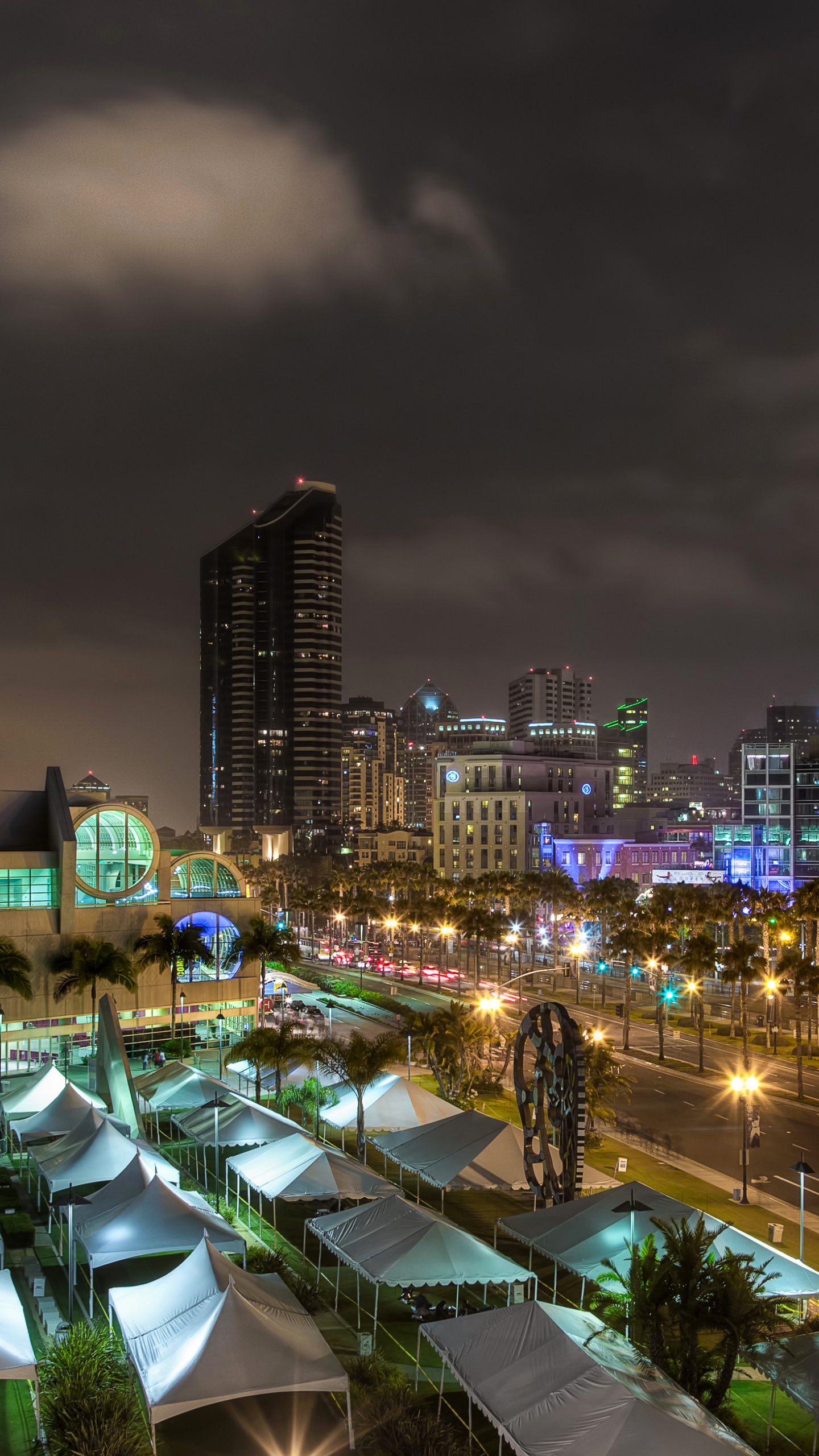 City With High Rise Buildings During Night Time. Wallpaper in 1440x2560 Resolution