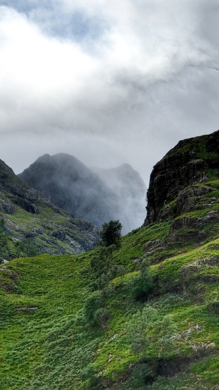 Green Mountain Under White Clouds During Daytime. Wallpaper in 720x1280 Resolution
