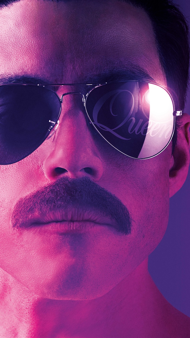 Woman Wearing Black Sunglasses With Purple and Blue Eyes. Wallpaper in 720x1280 Resolution