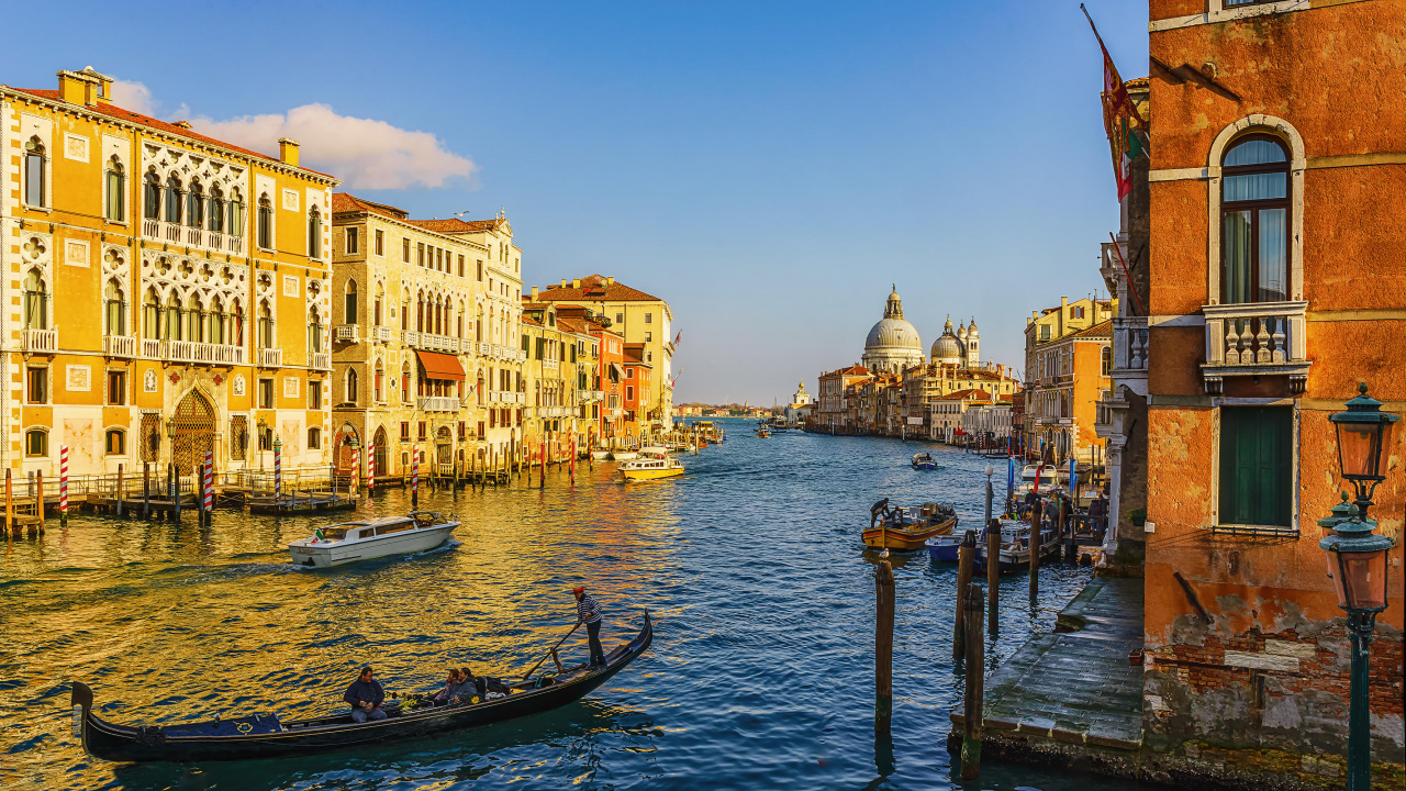 People Riding on Boat on River Near Buildings During Daytime. Wallpaper in 1280x720 Resolution