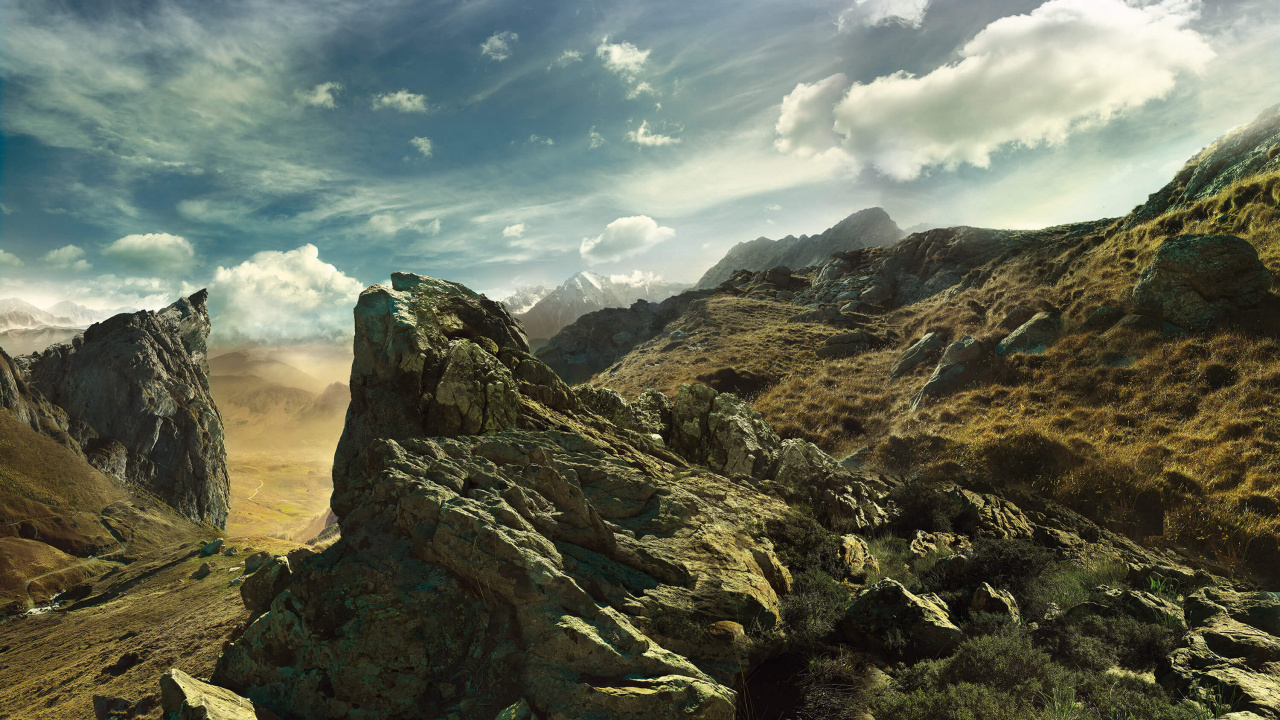 Brown Rocky Mountain Under Blue Sky During Daytime. Wallpaper in 1280x720 Resolution