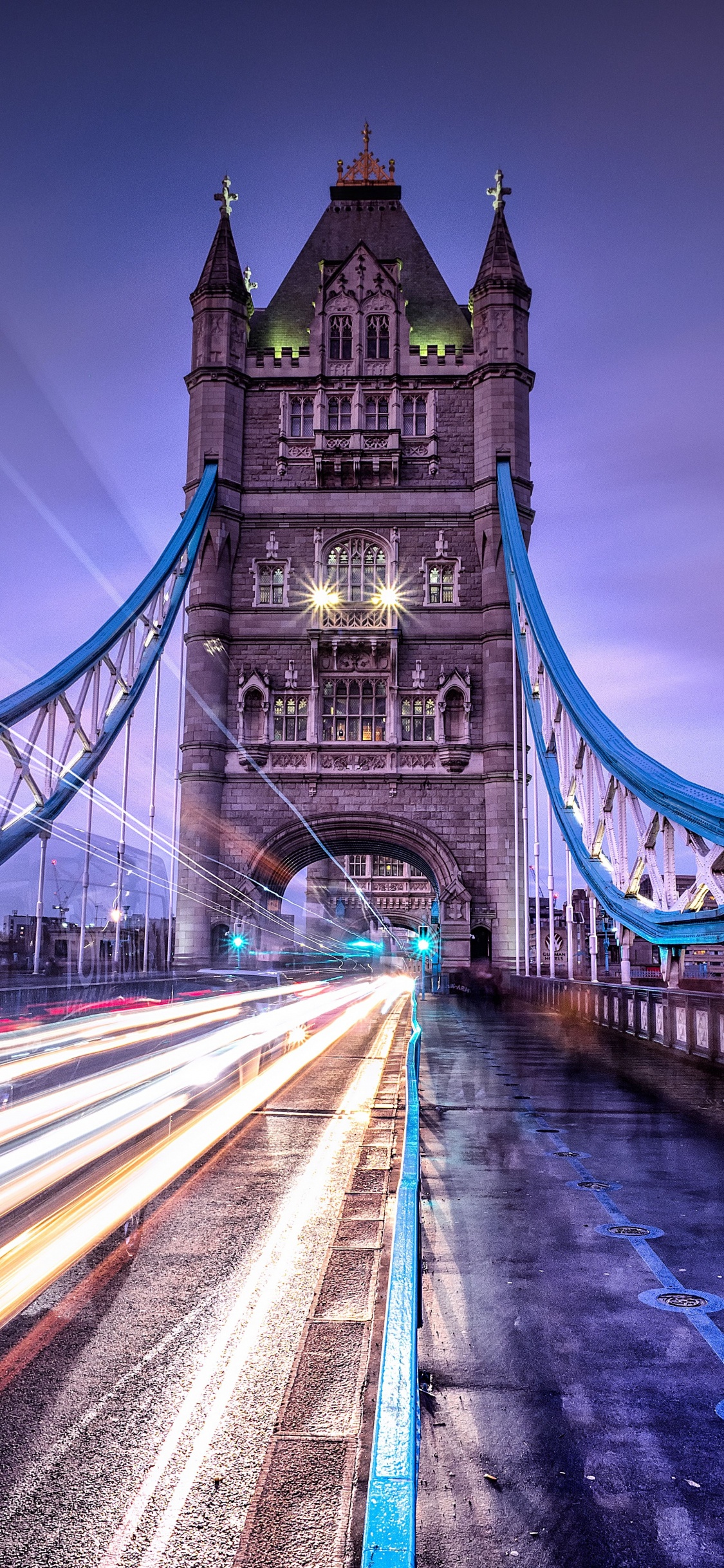 Time Lapse Photography of Bridge During Night Time. Wallpaper in 1125x2436 Resolution