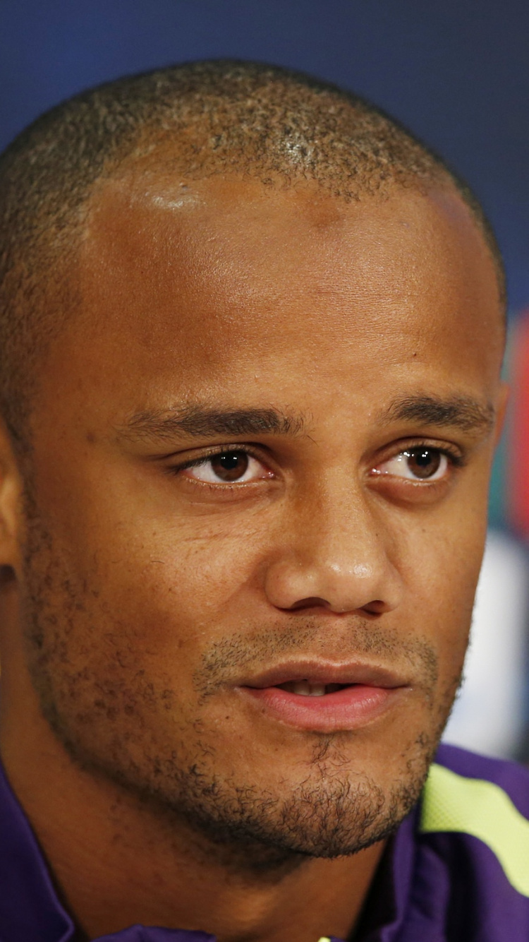 Man in Blue and Yellow Adidas Shirt. Wallpaper in 750x1334 Resolution